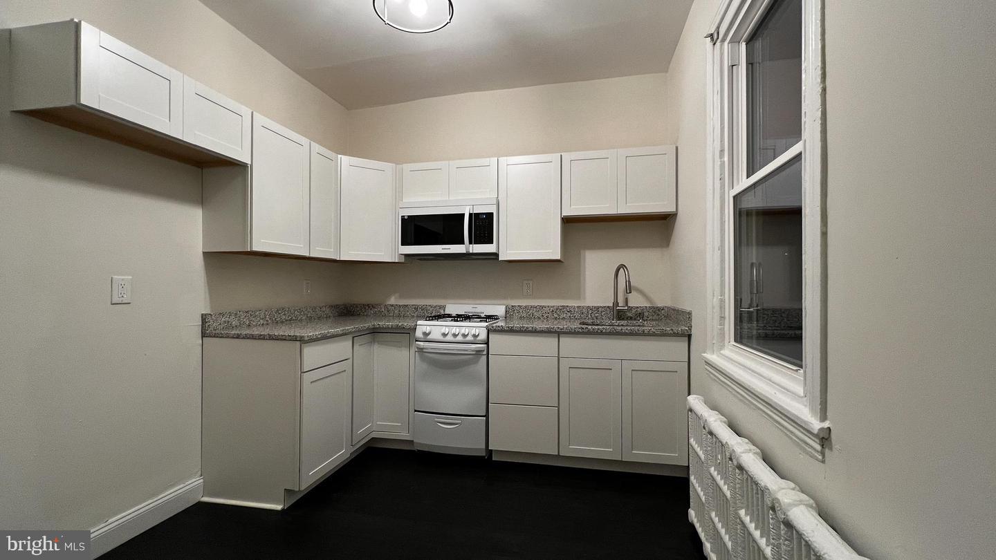 7827 MONTGOMERY AVE #ONE BEDROOM 1E Property Photo 1