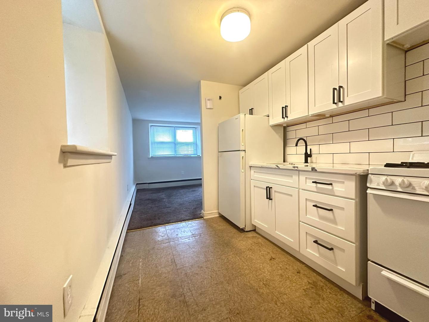 7712-14 Watson St Property Photo 9