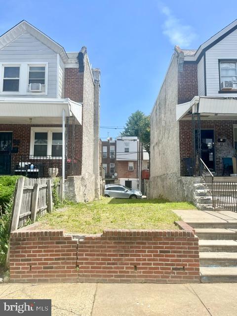 6731 Woolston Ave Property Photo 1