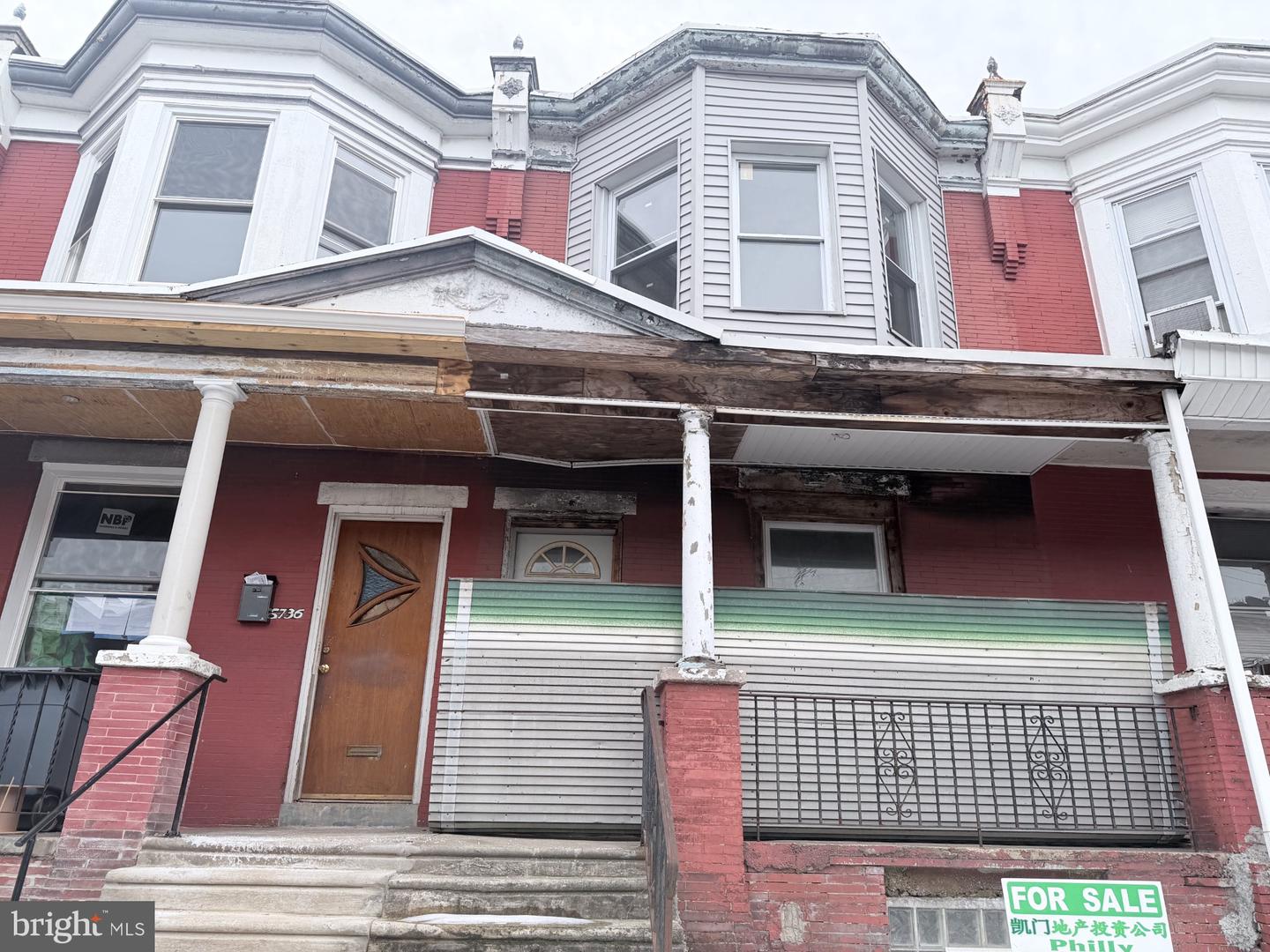 5738 DELANCEY ST Property Photo 1