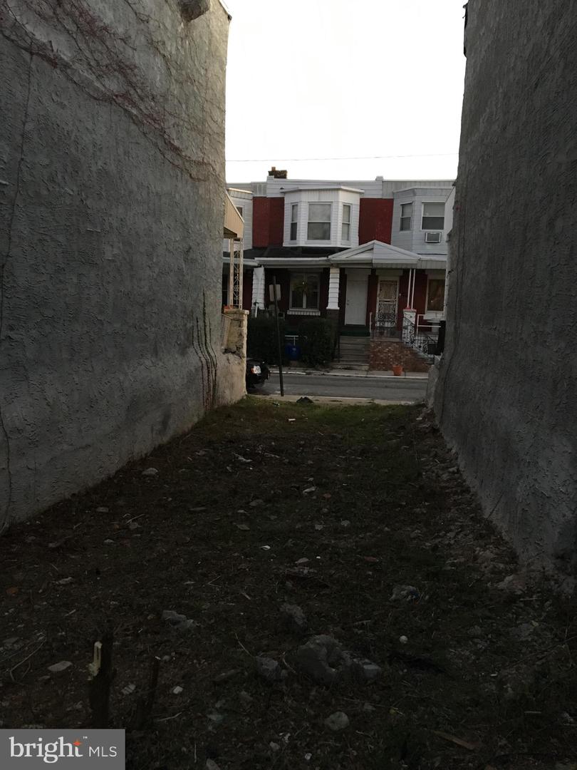 6017 DELANCEY ST Property Photo 1