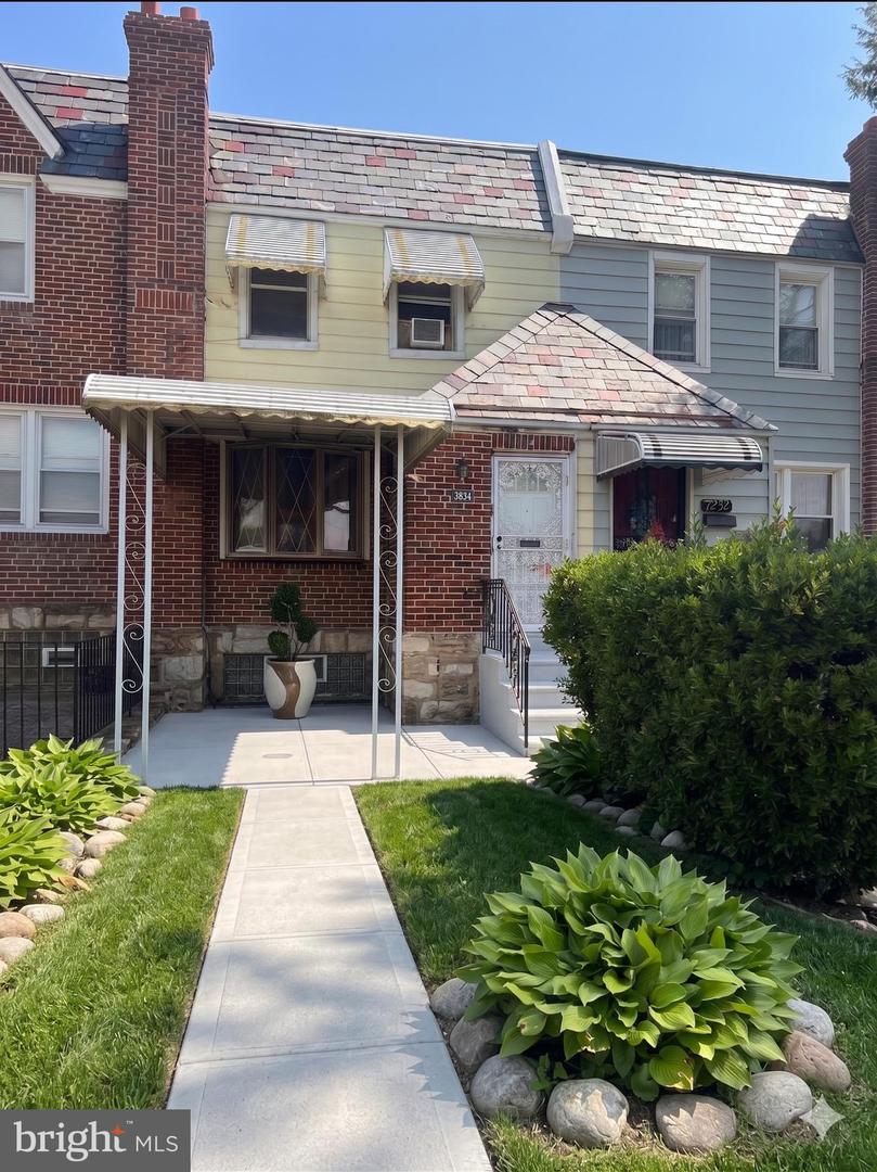 7939 Woolston Ave Property Photo 1