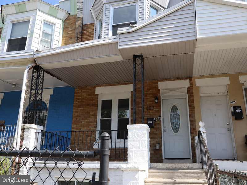 6037 SPRUCE ST Property Photo 1