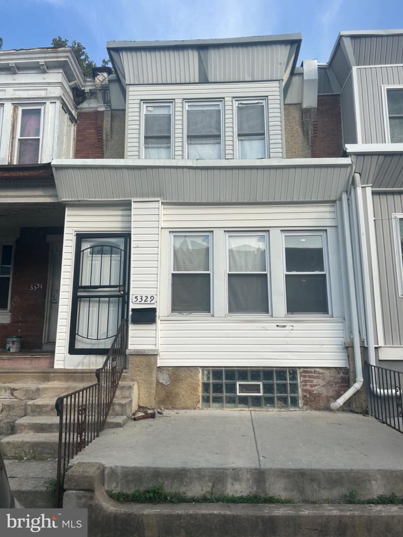 5329 Malcolm St Property Photo 1