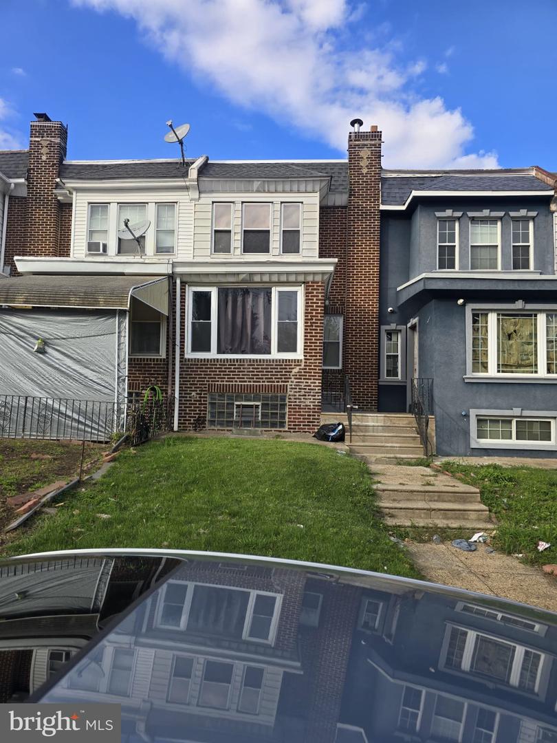 1549 E HUNTING PARK AVE Property Photo 1