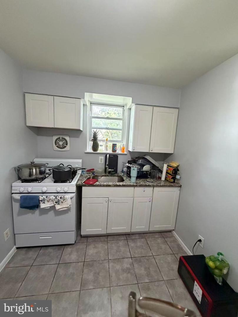 6904-00 RISING SUN AVE #A Property Photo 1