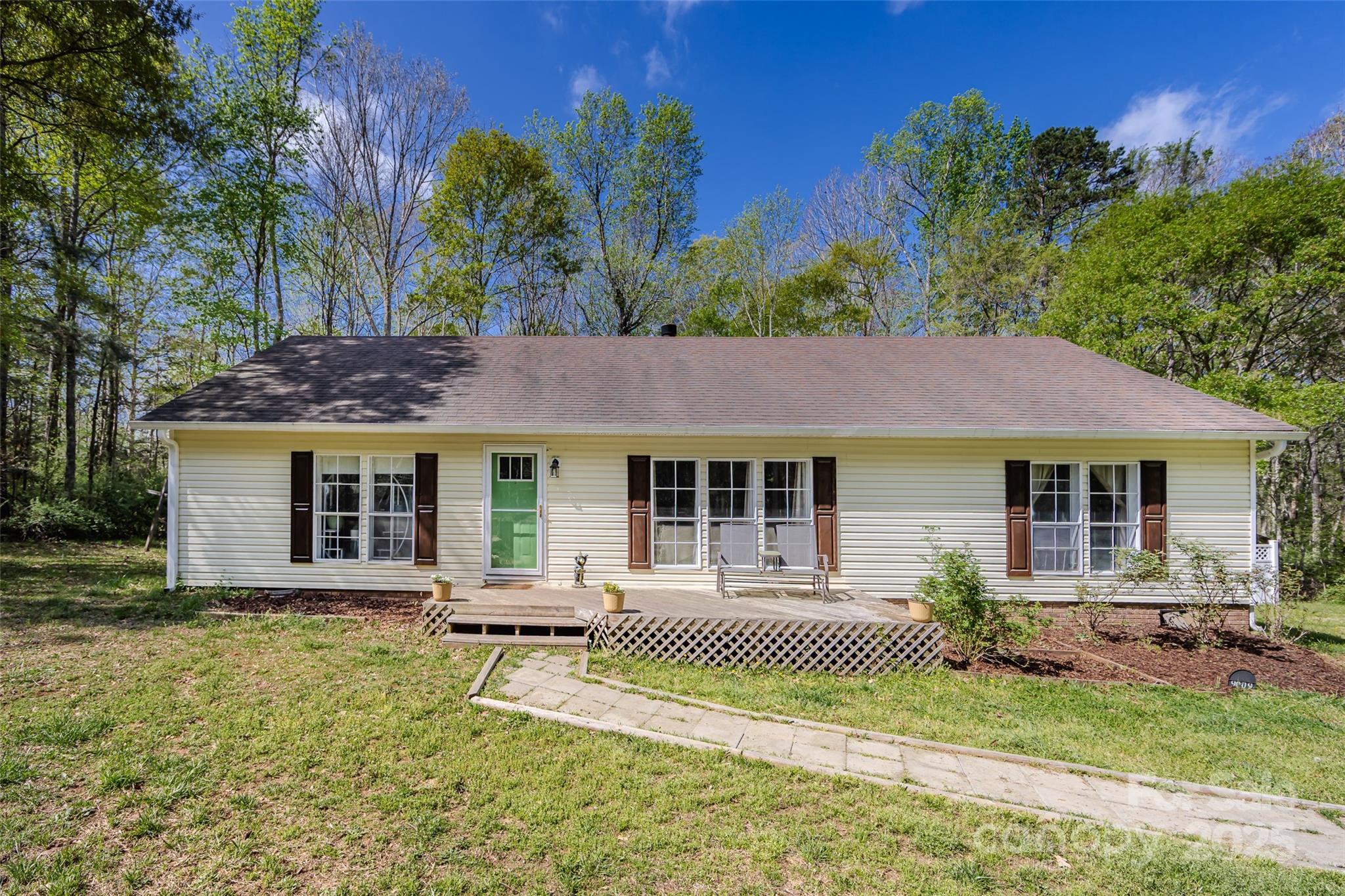 9009 Quail Roost Drive Property Photo 1