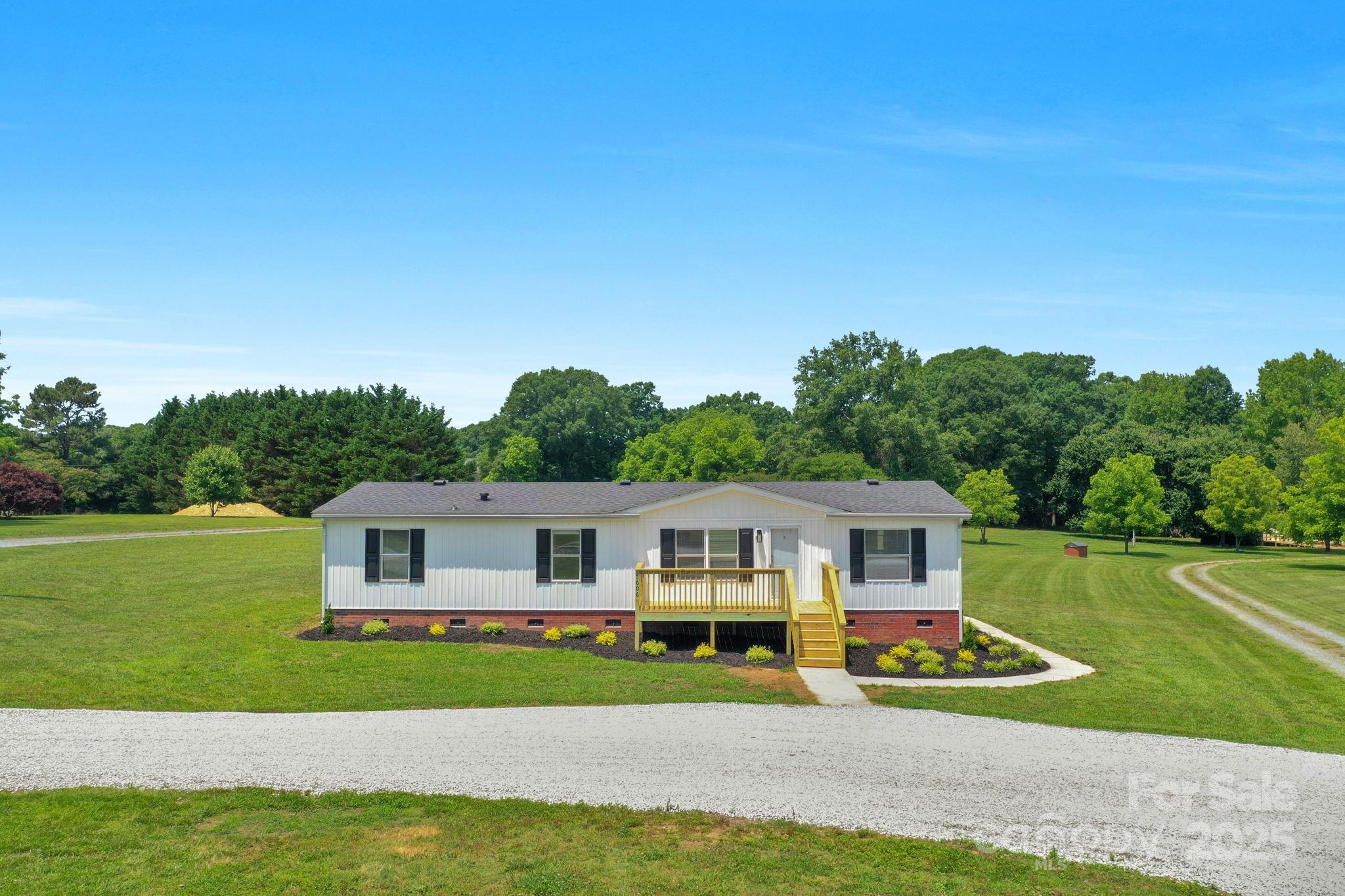 5606 S Rocky River Road Property Photo 1