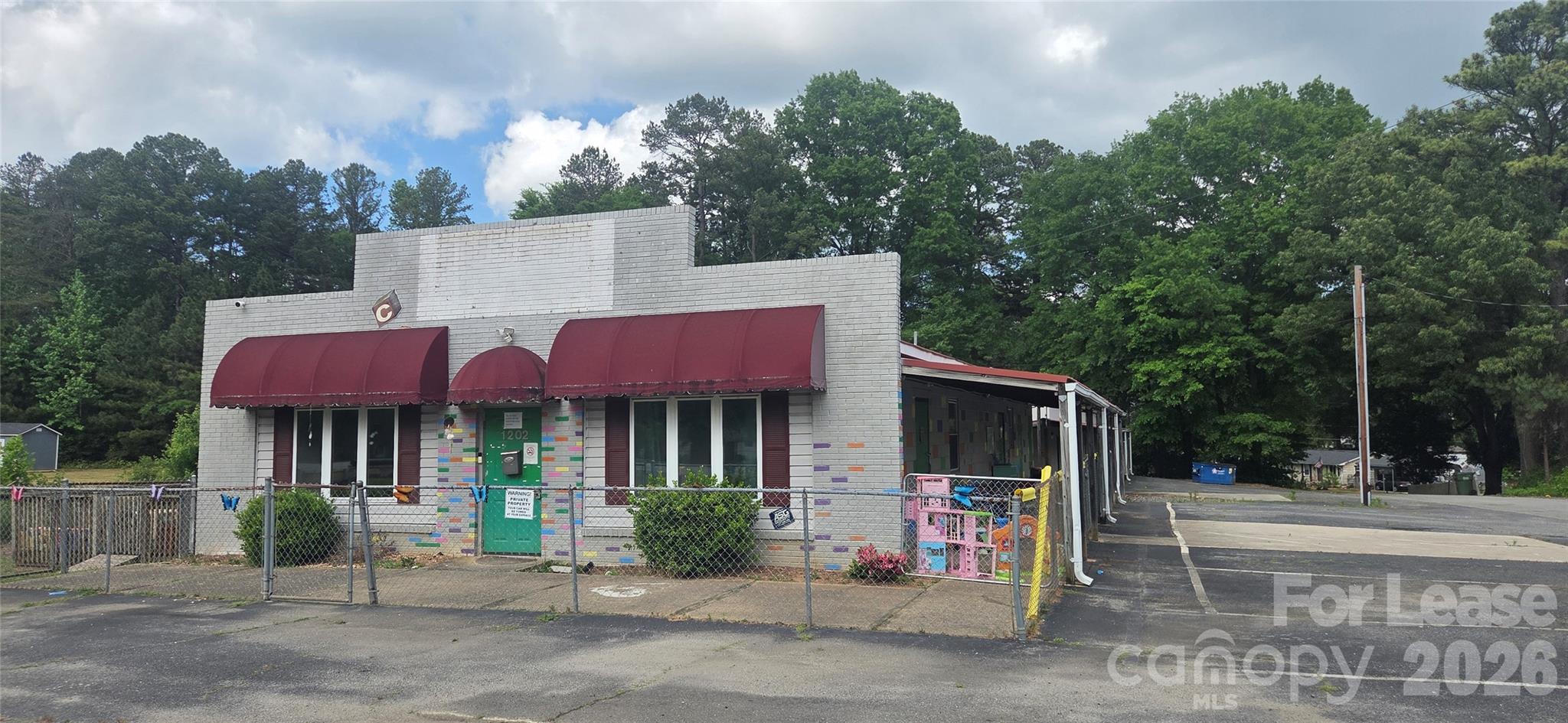 1202 Charles Raper Jonas Highway Property Photo 1
