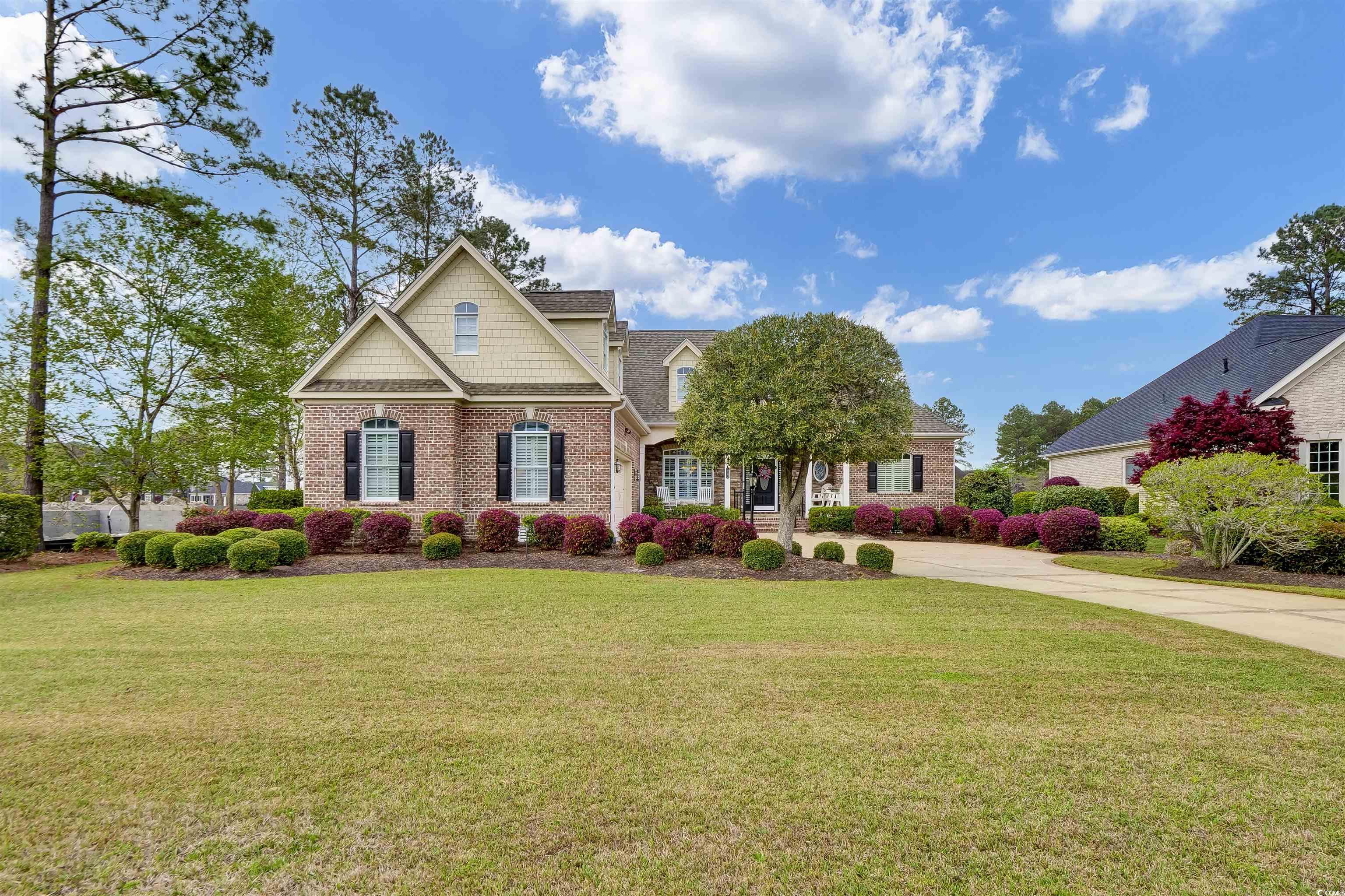 9278 Nw Checkerberry Square Property Photo 1