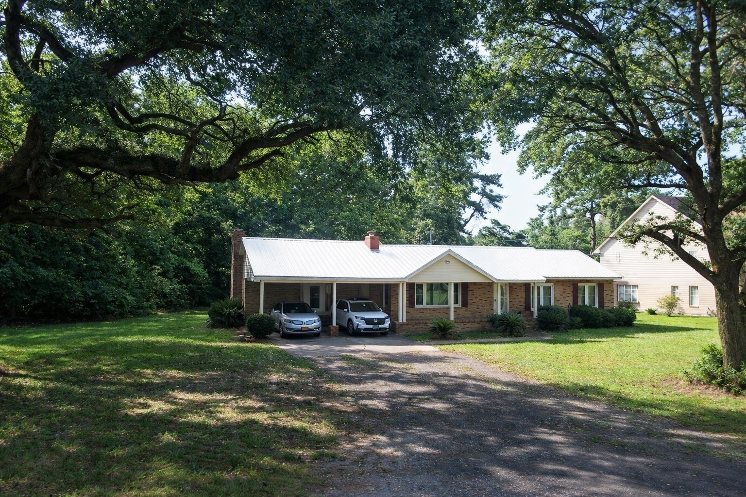 4878 South Fraser St. Property Photo 1