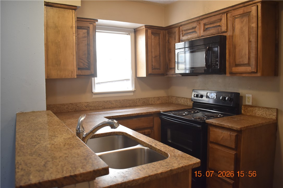 1011 Ennis Joslin Property Photo 2