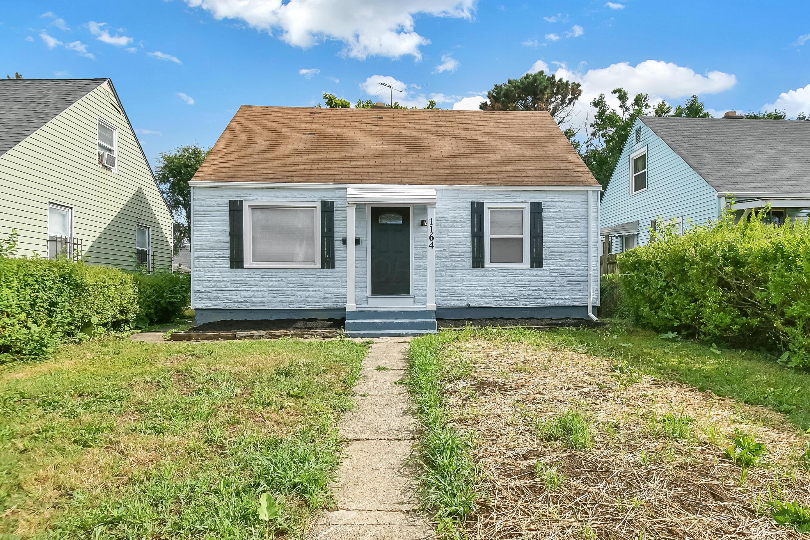 1164 E 24th Avenue Property Photo 1