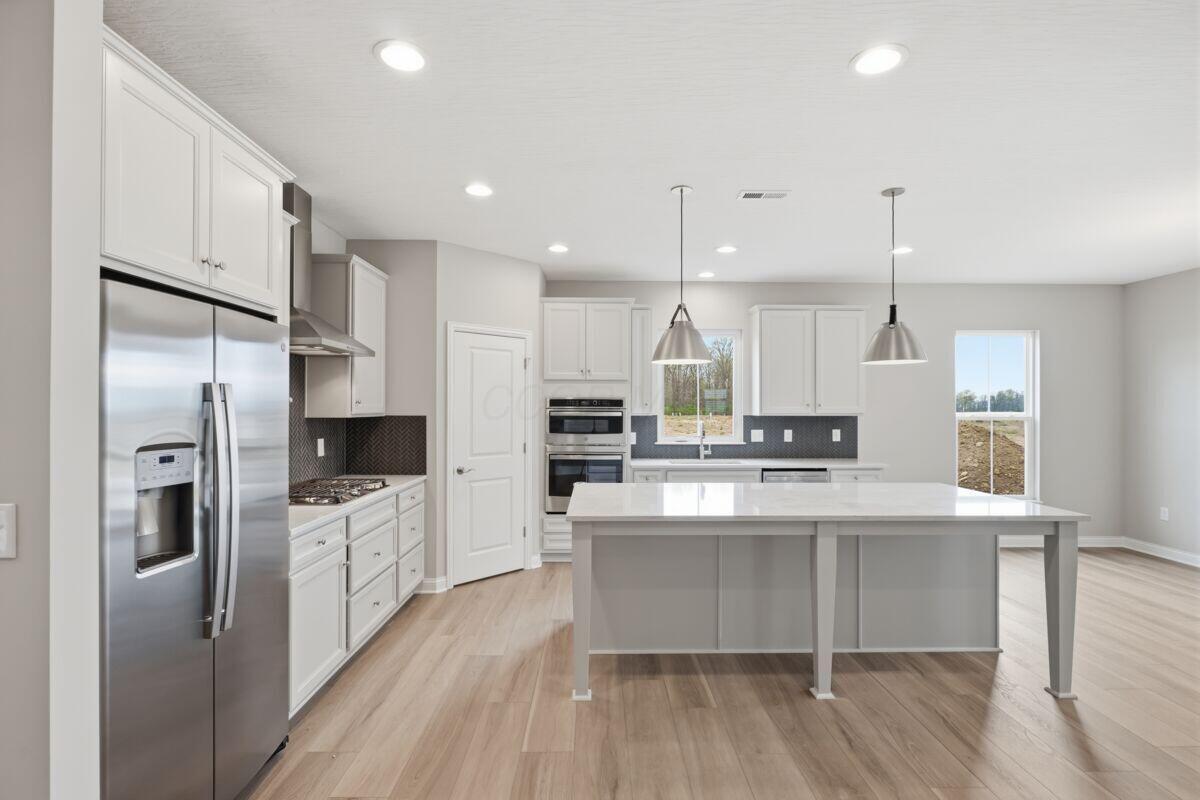 6958 Corsican Loop N Property Photo 24