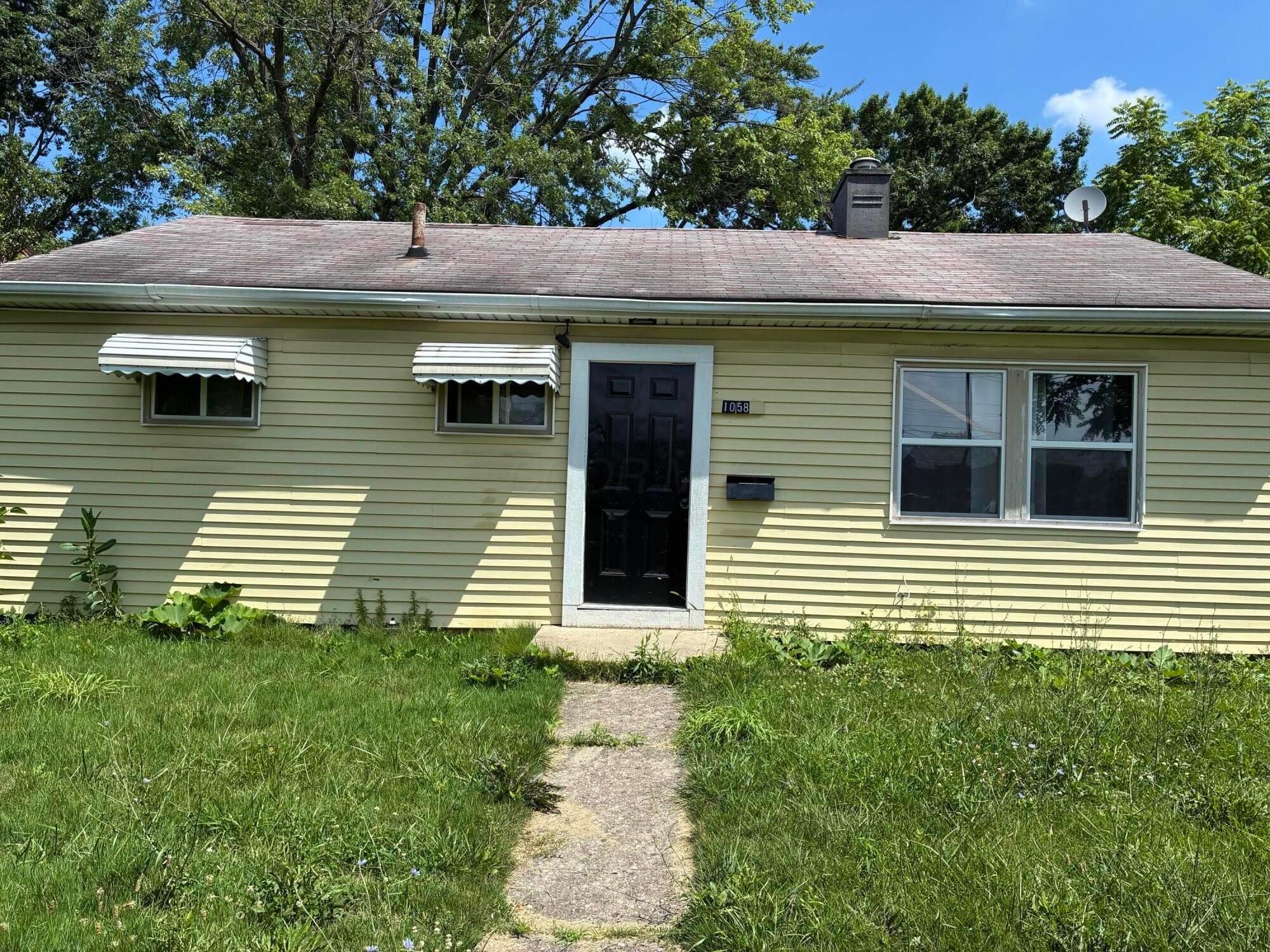 1058 E 26th Avenue Property Photo 1