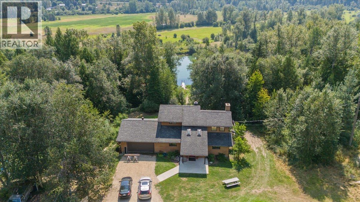 6172 SLOCAN RIVER Road Property Photo 1