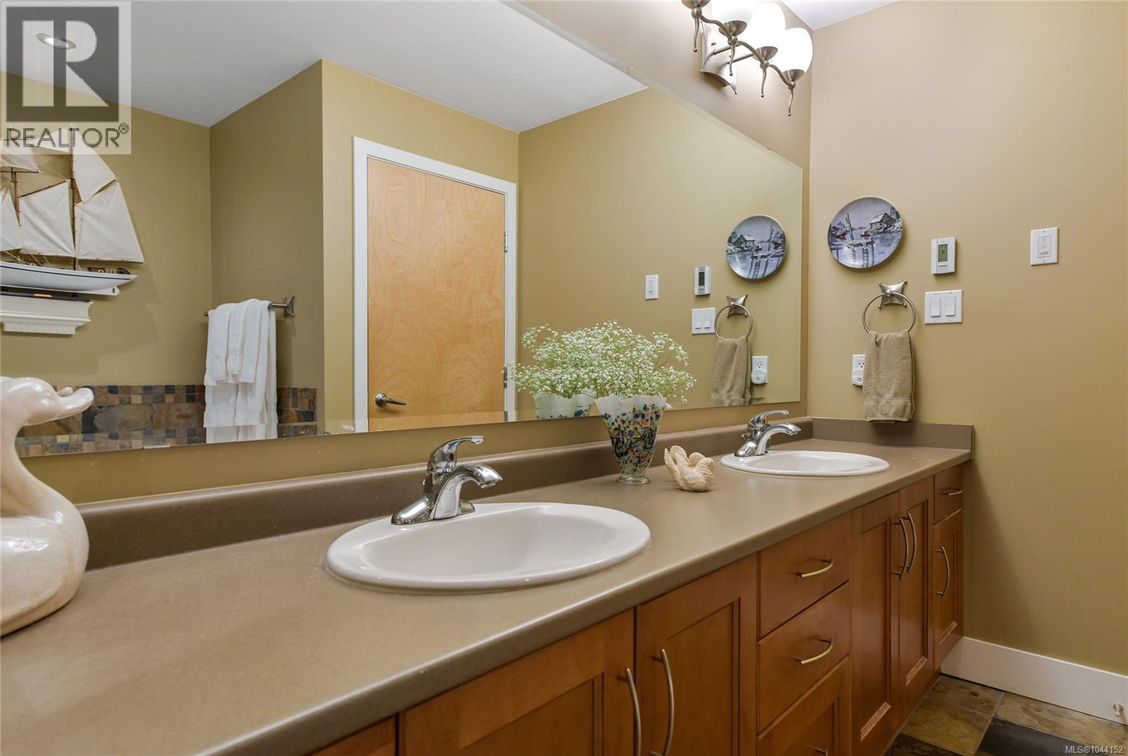 307 5332 Sayward Hill Cres Property Photo 40
