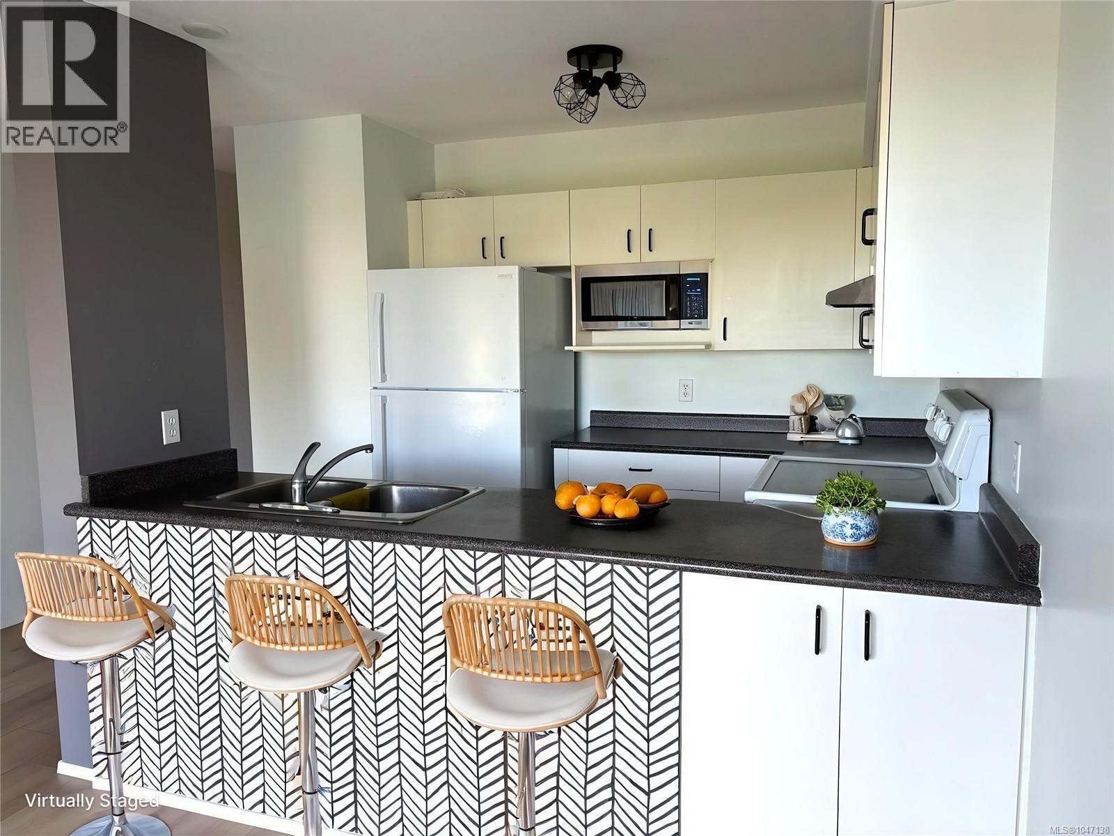 106 9916 Daniel St Property Photo 2