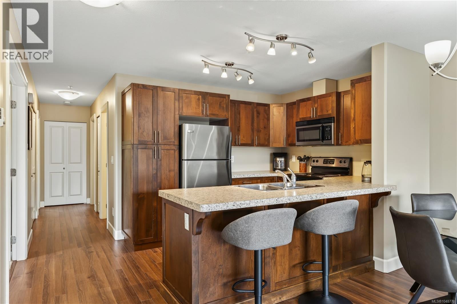 201 5965 Kaden Pl Property Photo 4