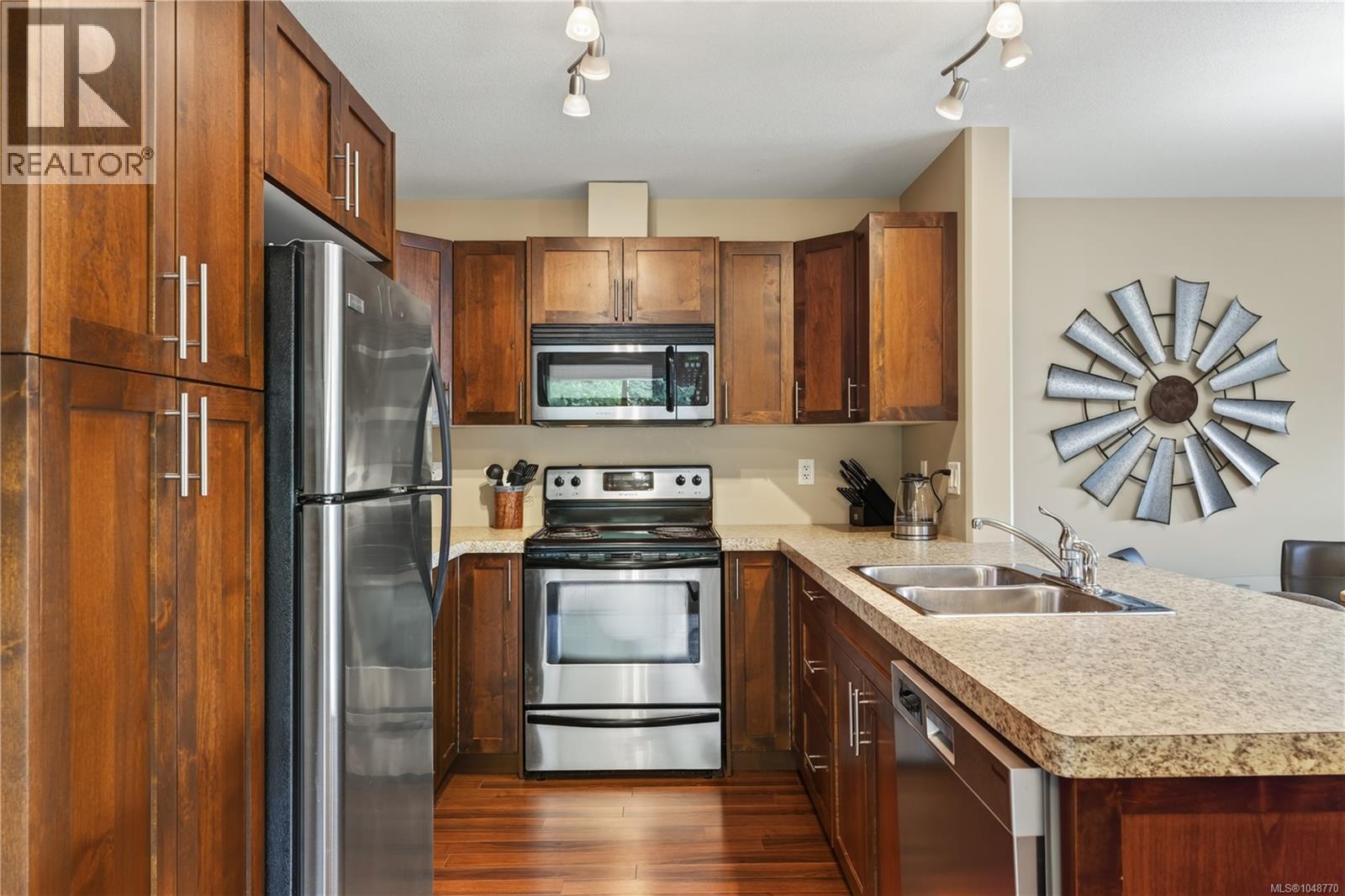 201 5965 Kaden Pl Property Photo 5