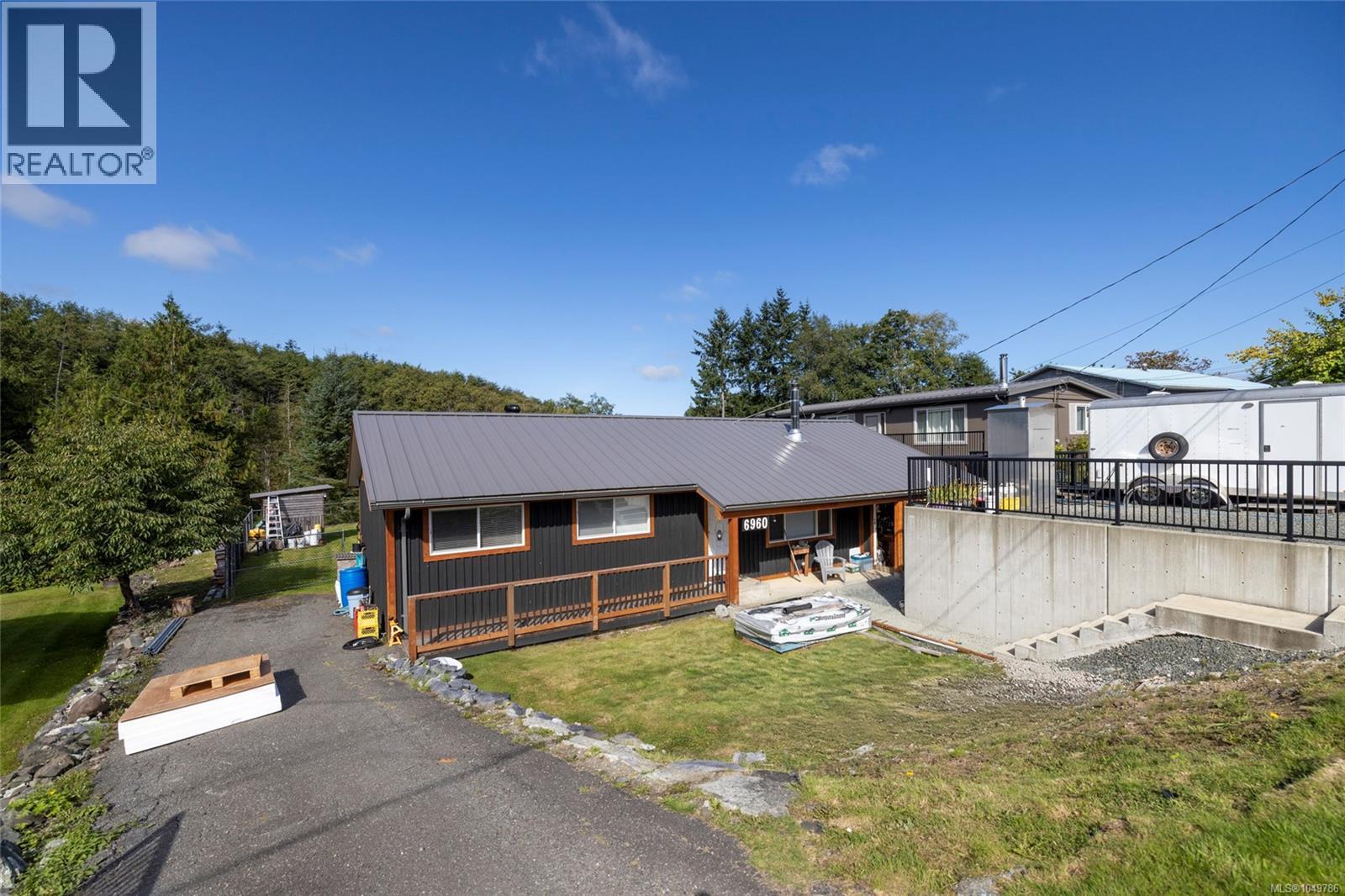 6960 Quatse Cres Property Photo 1