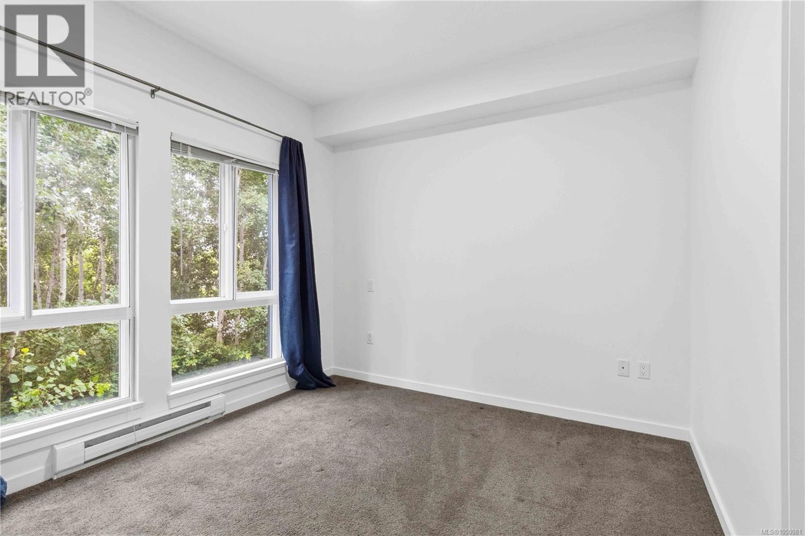 203 4050 Douglas St Property Photo 19