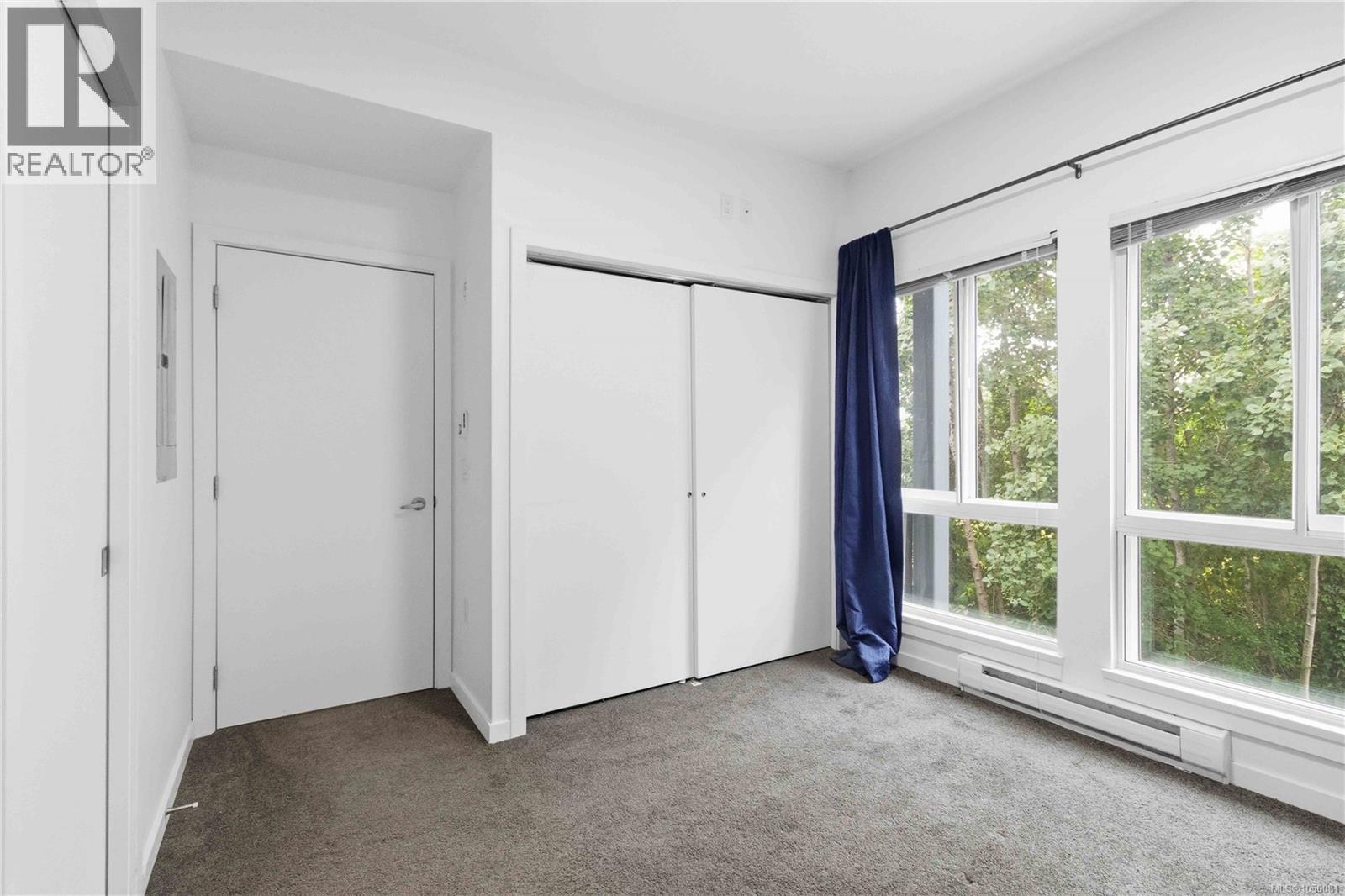 203 4050 Douglas St Property Photo 23