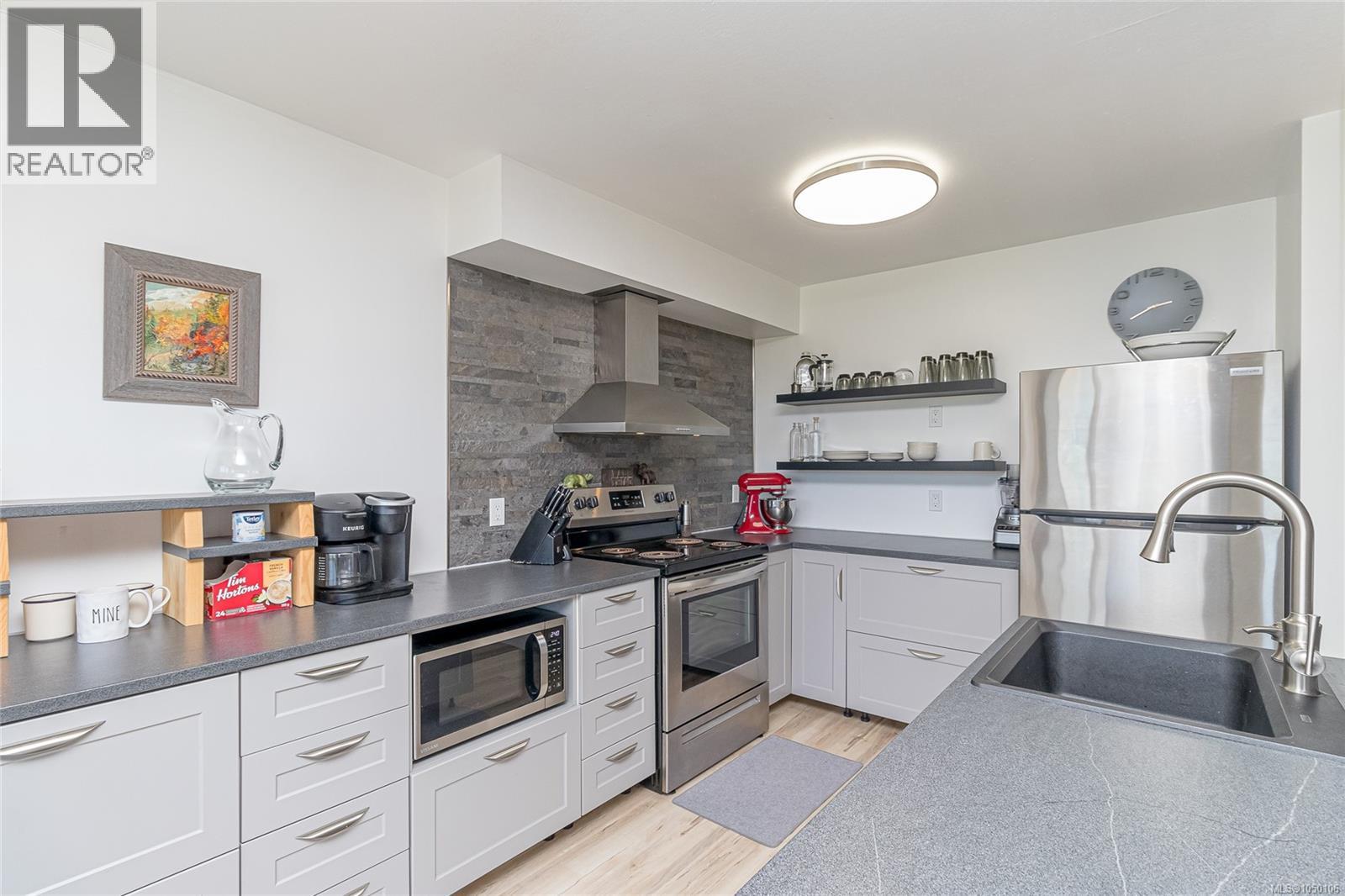 107 9916 Daniel St Property Photo 14