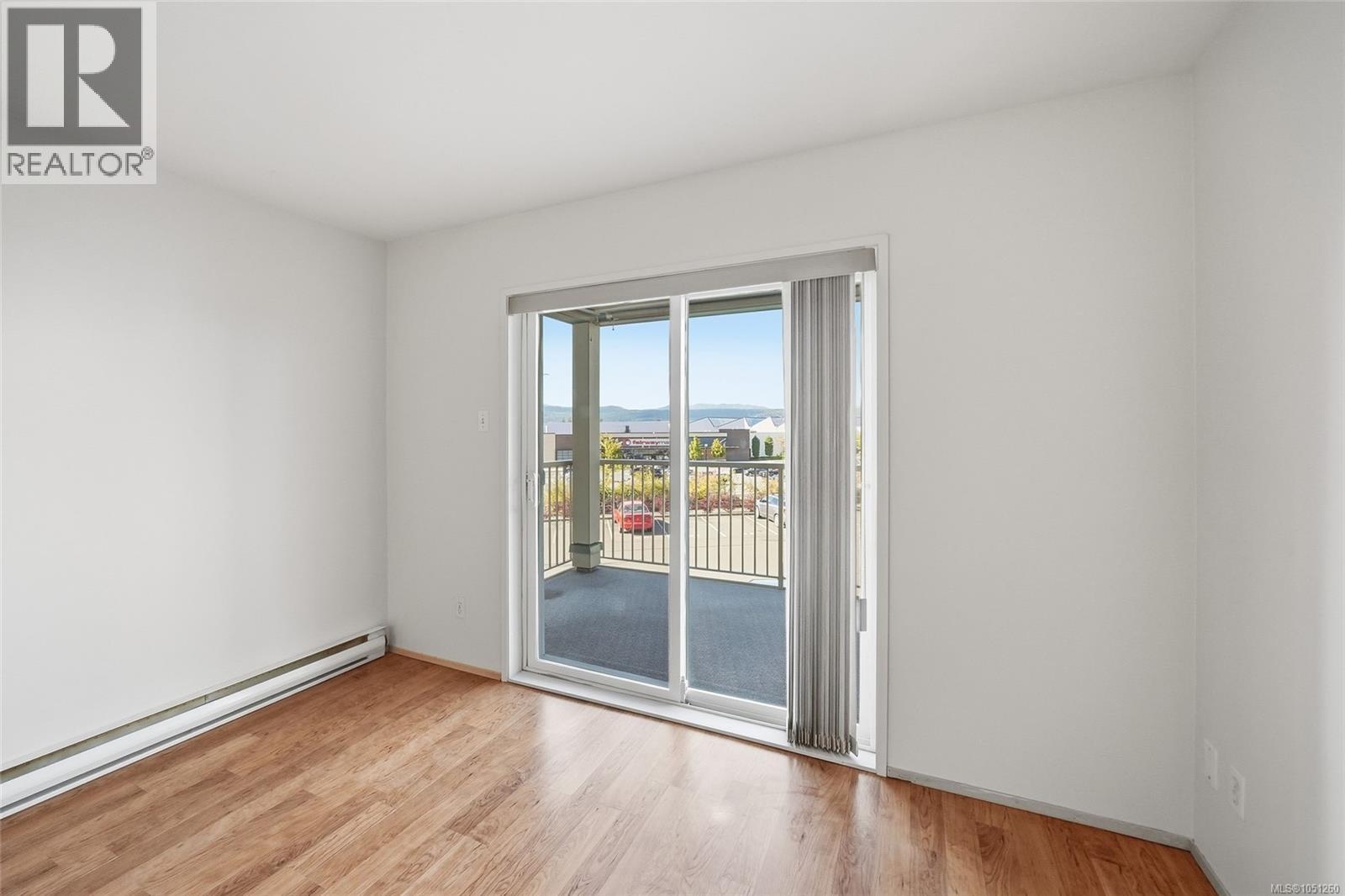 205 4971 Songbird Pl Property Photo 5