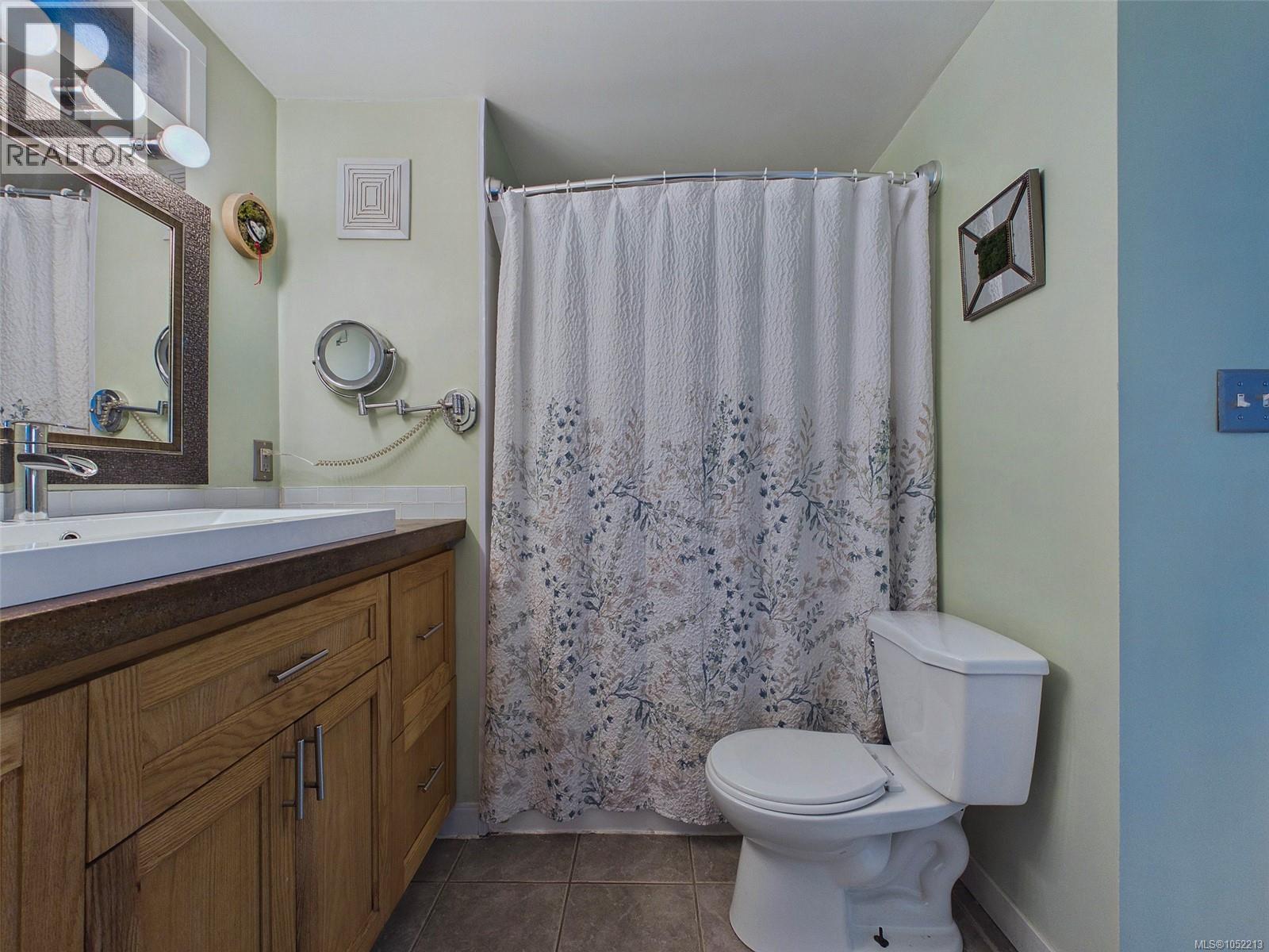 30 1201 Craigflower Rd Property Photo 12