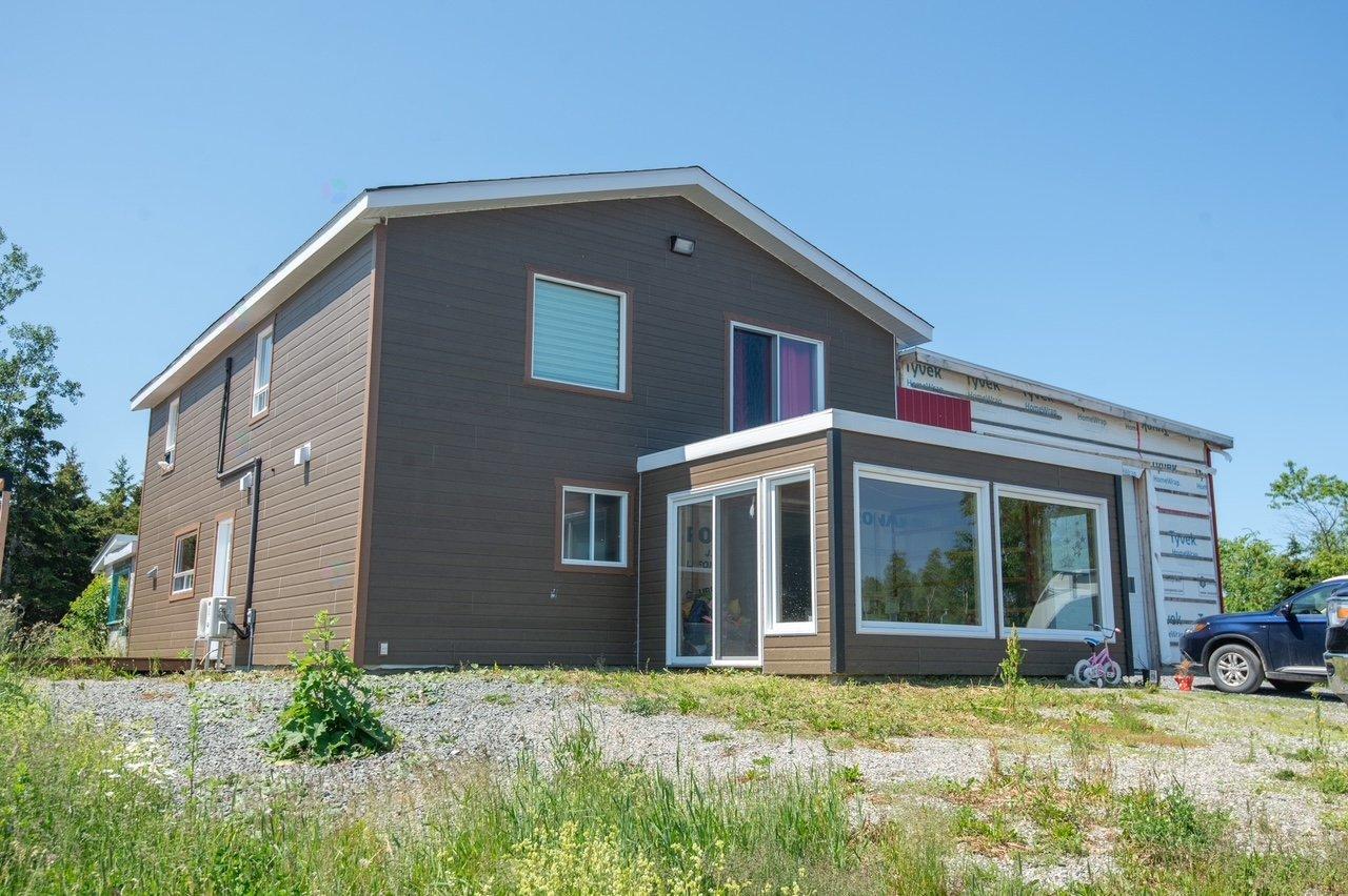 90 30e Rue O. Photo de la propriété 1