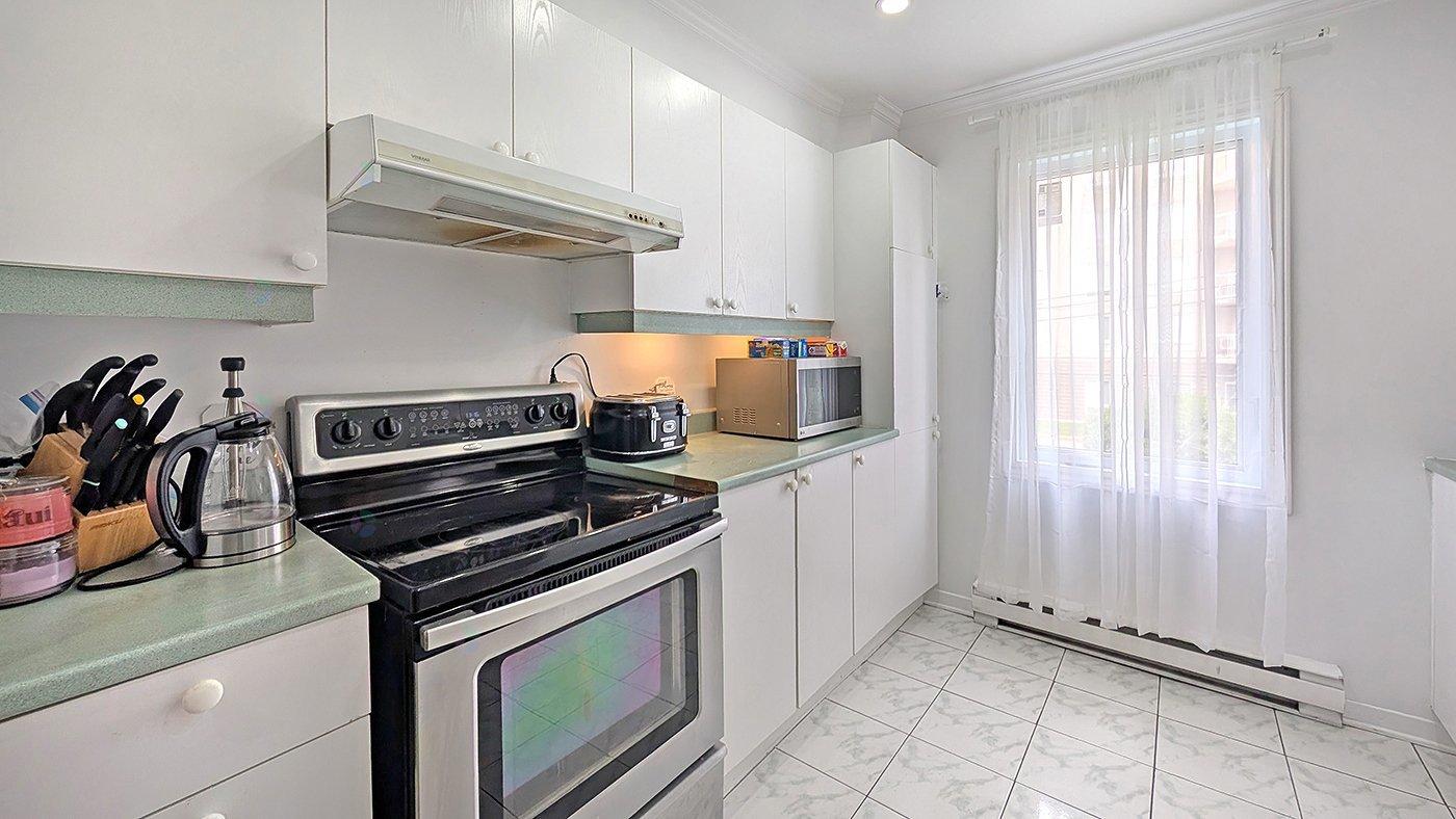 7081 Rue St-zotique E., #203 Property Photo 15