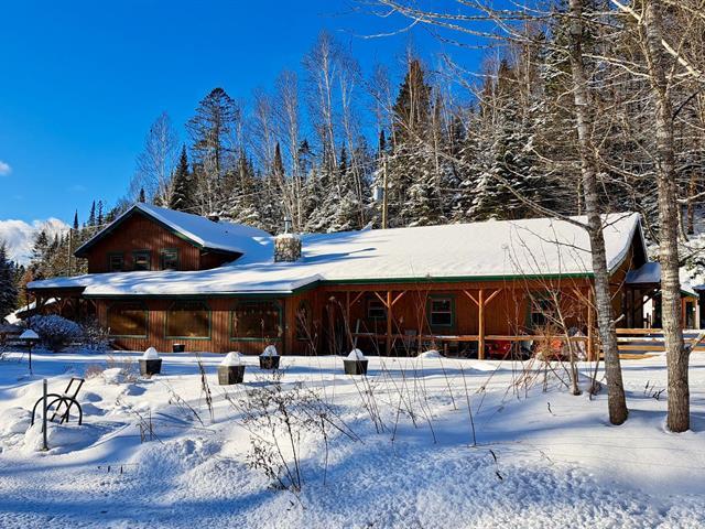 7014 Rue Du Trappeur Property Photo 1