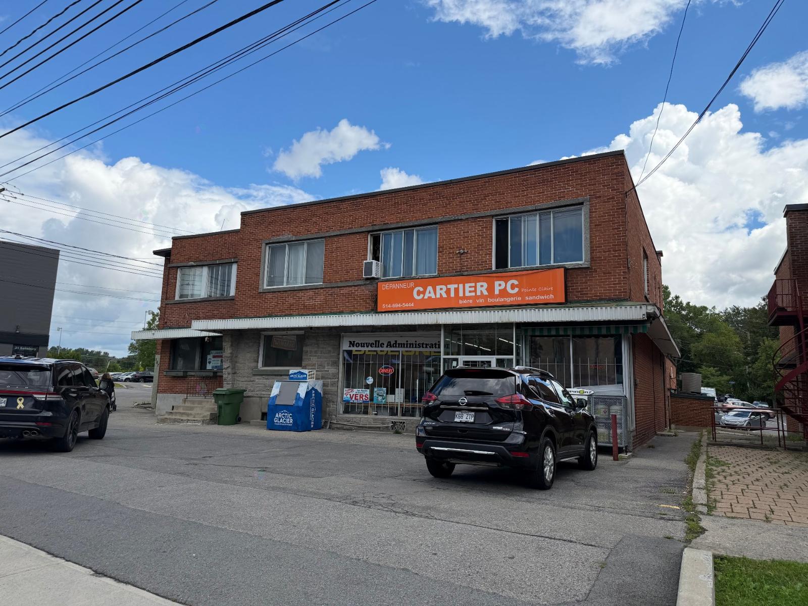 181-187 Av. Cartier Property Photo 1