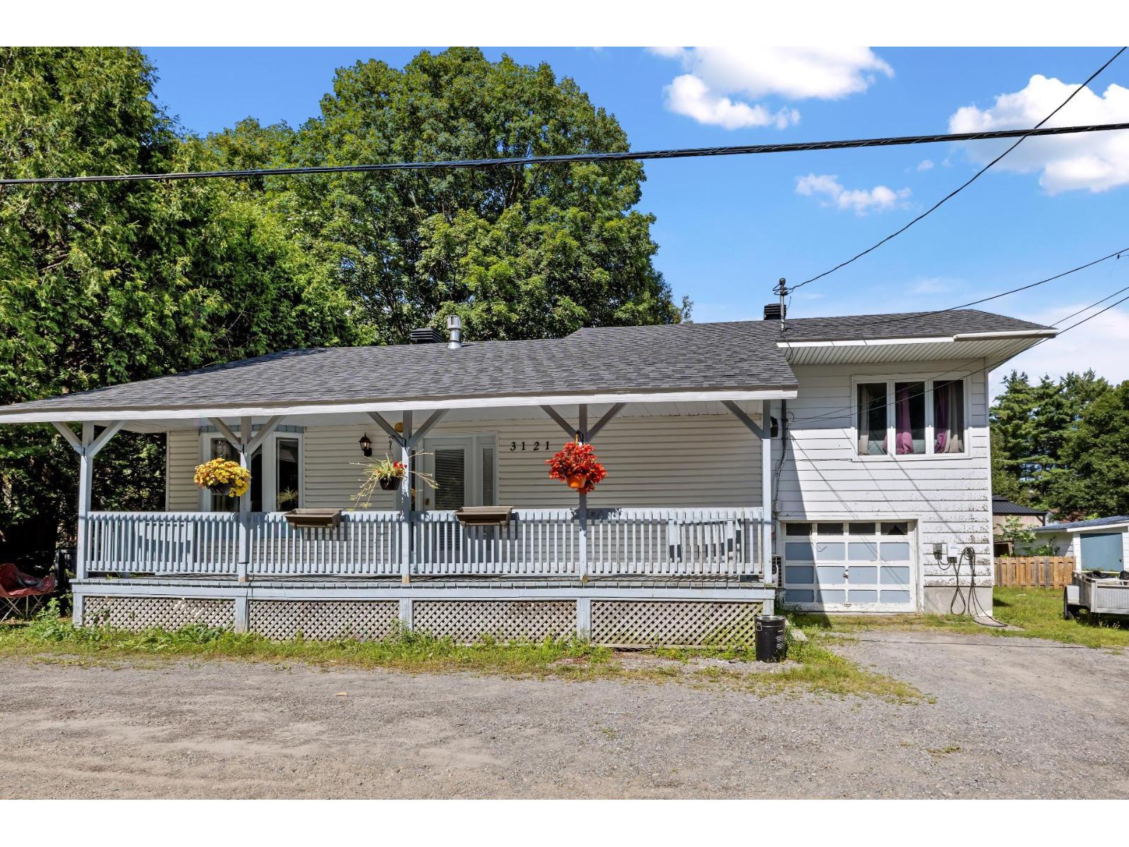 3121 4e Avenue Du Lac-quinn Property Photo 1