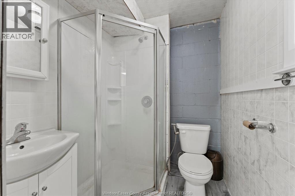 921 Tecumseh Road West Unit# Front Property Photo 11