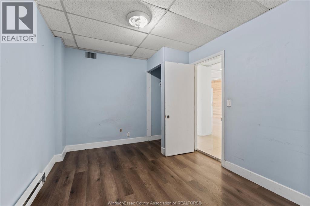 921 Tecumseh Road West Unit# Front Property Photo 13