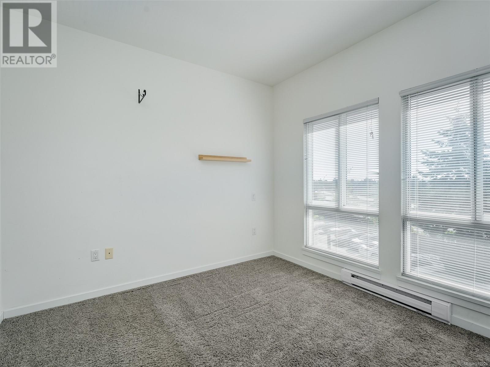 303 4052 Douglas St Property Photo 11