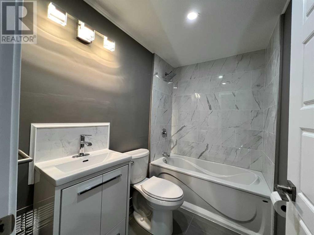 11, 7895 49 Avenue Property Photo 9