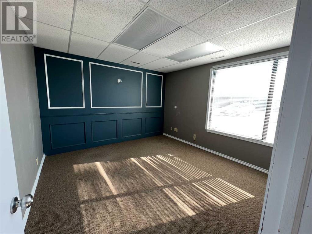 2, 7895 49 Avenue Property Photo 1