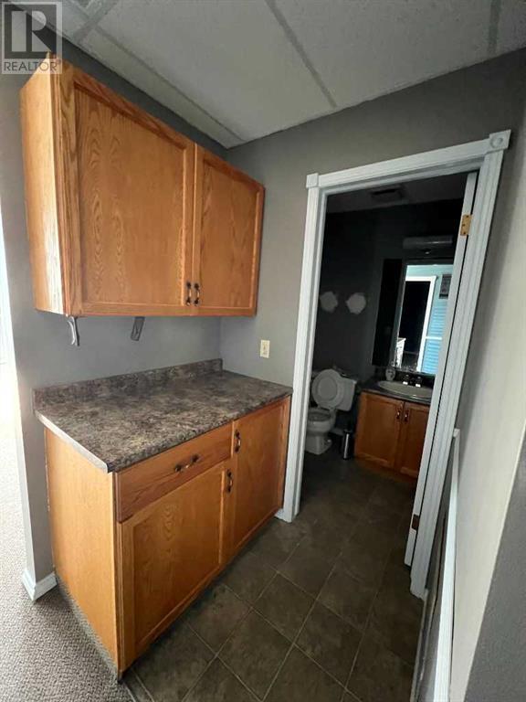 2, 7895 49 Avenue Property Photo 2