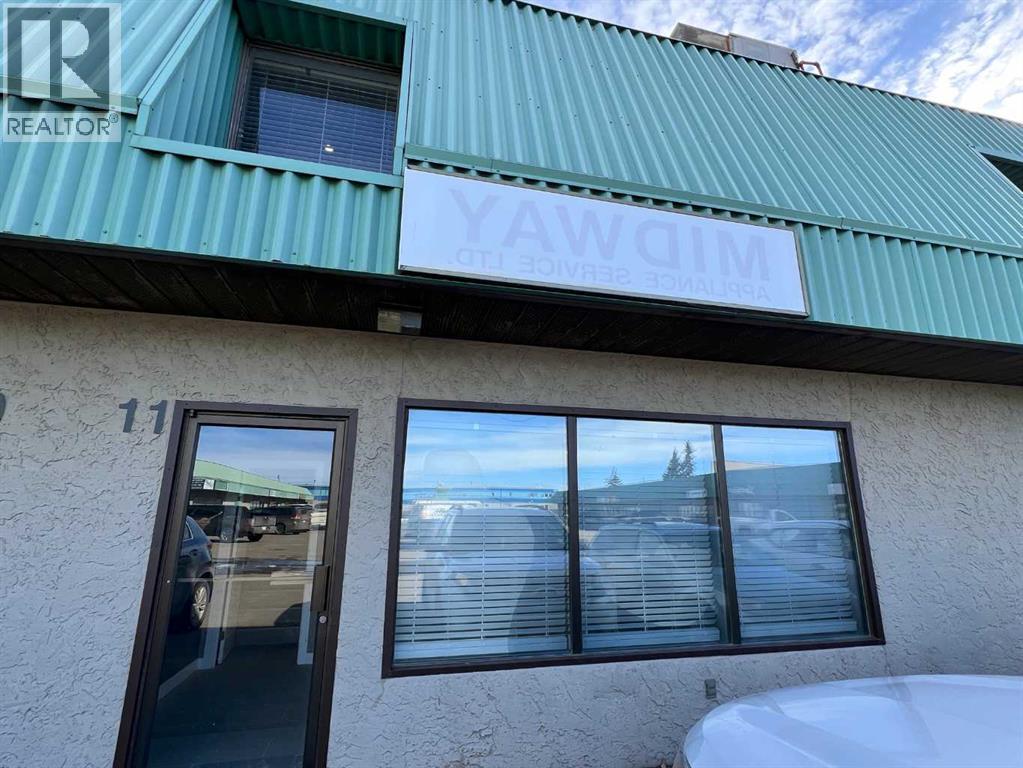 11, 7895 49 Avenue Property Photo 1