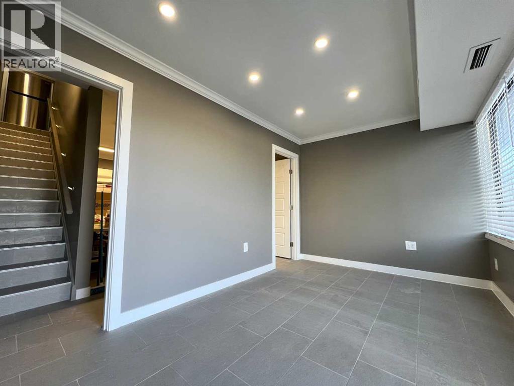 11, 7895 49 Avenue Property Photo 2