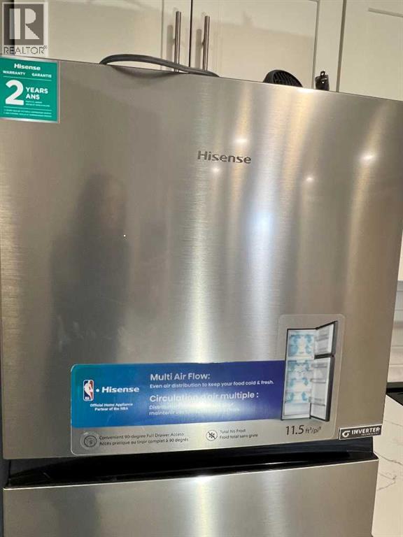 11, 7895 49 Avenue Property Photo 4