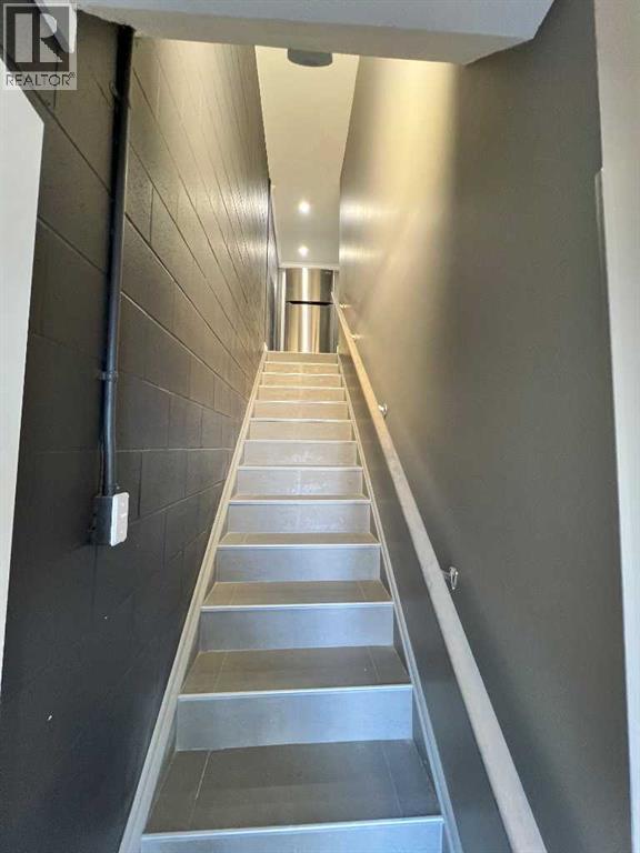 11, 7895 49 Avenue Property Photo 6