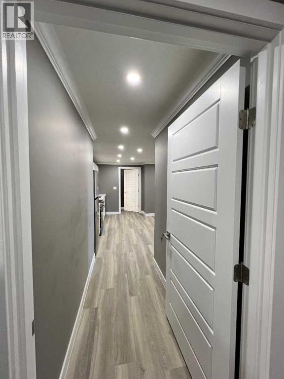 11, 7895 49 Avenue Property Photo 7