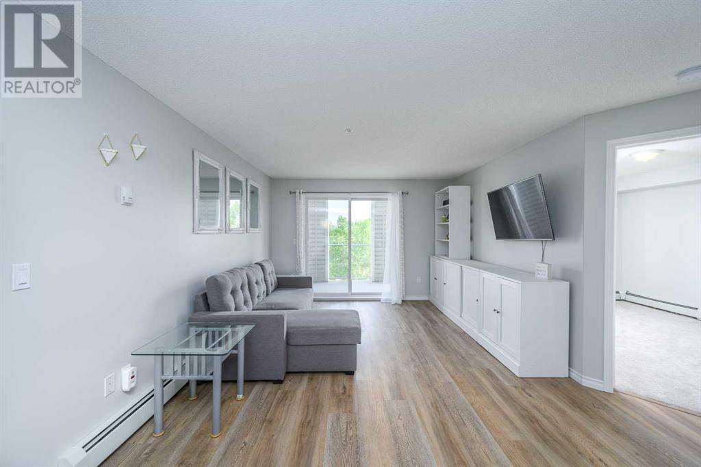 1309, 17 Country Village Bay Ne Property Photo 1