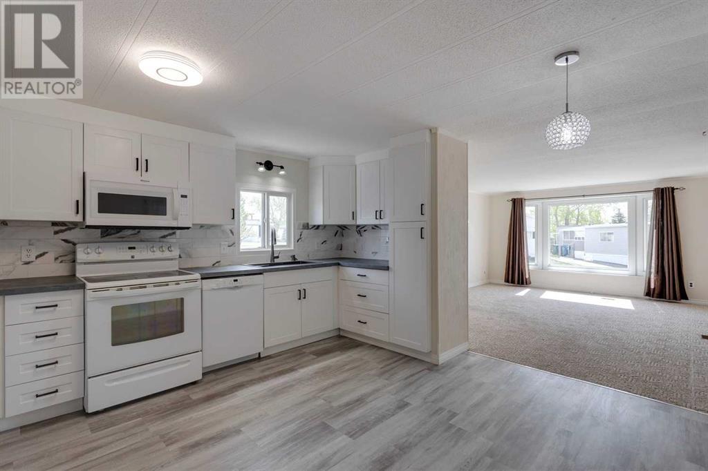 290, 99 Arbour Lake Road Nw Property Photo 1
