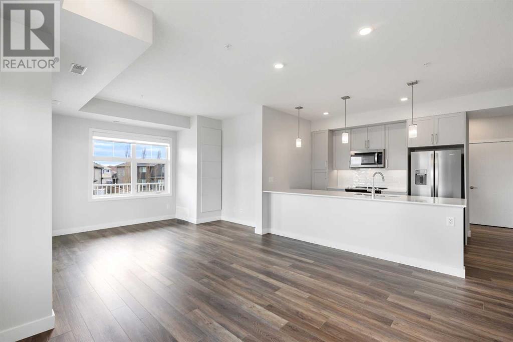 202, 255 Les Jardins Park SE Property Photo 1