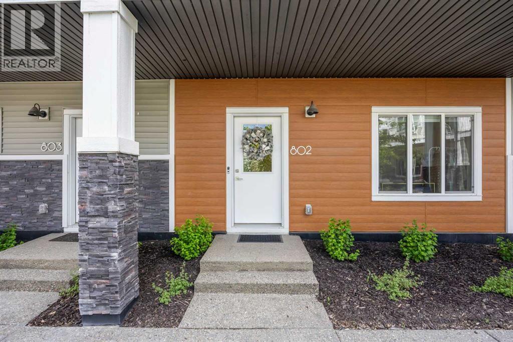 802, 335 Creekside Boulevard SW Property Photo 1